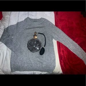 H&M sweater with perfume image embroidered. Very warm and comfy!
